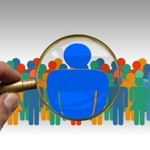 A graphic of multiple people with magnifying glass focussing on one person